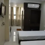 Twin Deluxe Room (Triple Sharing)